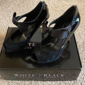 White House Black Market peep toe leather pump.  Size 6